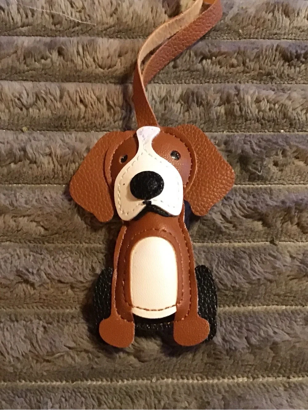 Brown and White Dog-Shaped Pet Tag or Accessory